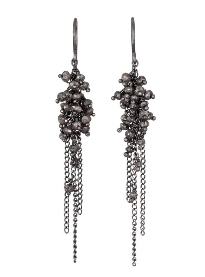 Photo of diamond beaded earrings with oxidised silver chain on white background.