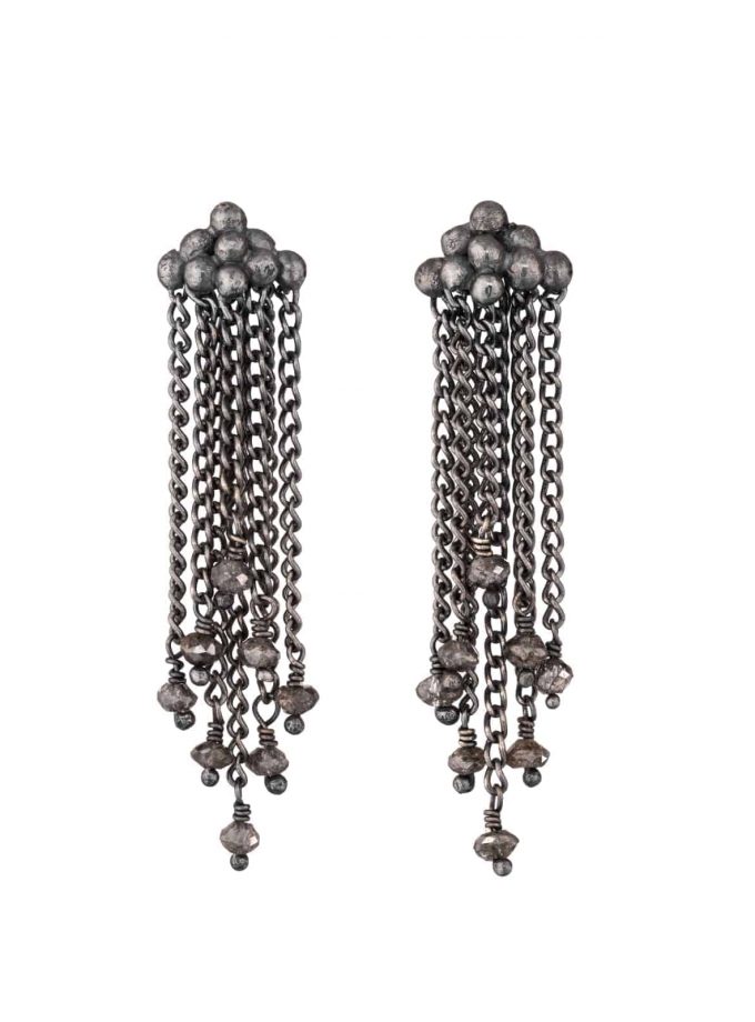 Photo of diamond and oxidised silver chain earrings on white background