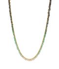 Photo of emerald beaded necklace with ombre effect on white background