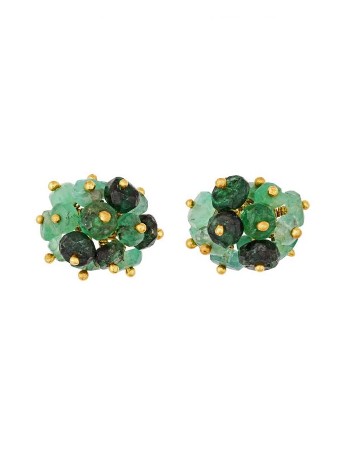Photo of emerald beaded stud earrings on white background