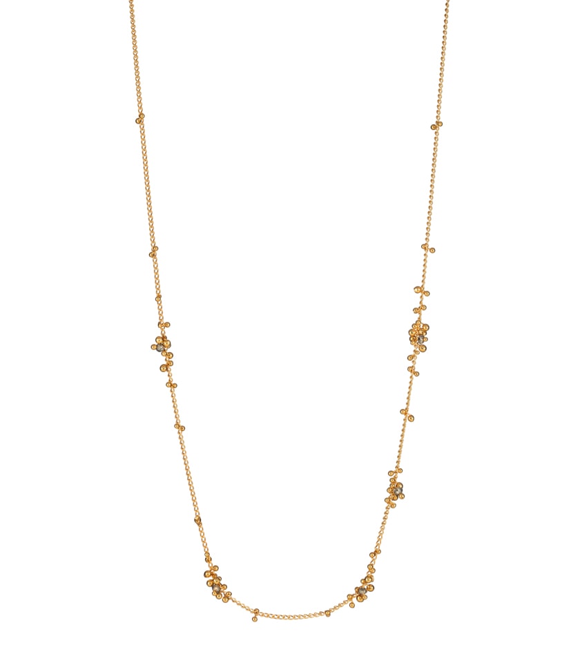 A gold plated silver chain necklace with little balls and diamond beads