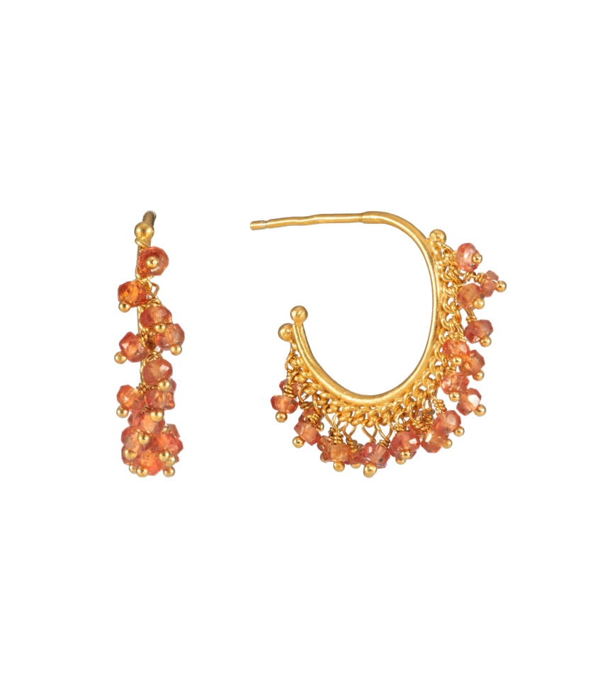 A pair of orange sapphire beaded hoop earrings in gold plated silver