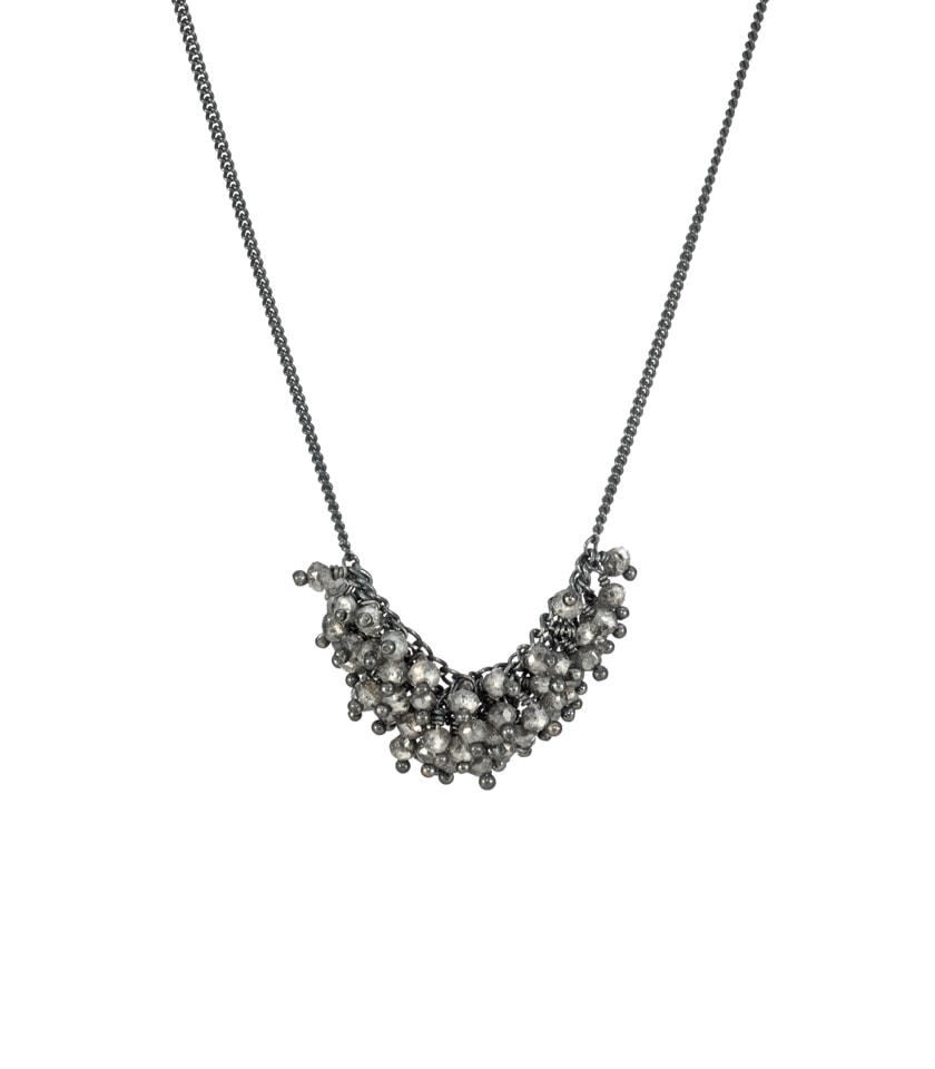 A dark grey diamond bead necklace on oxidised silver chain