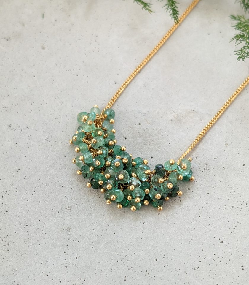 Necklace with emerald beads and gold plated silver